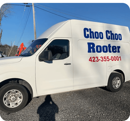 A white van with the words " choo choo rooter ".