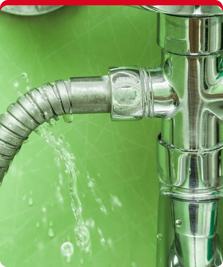 A close up of the water flowing out of a faucet.